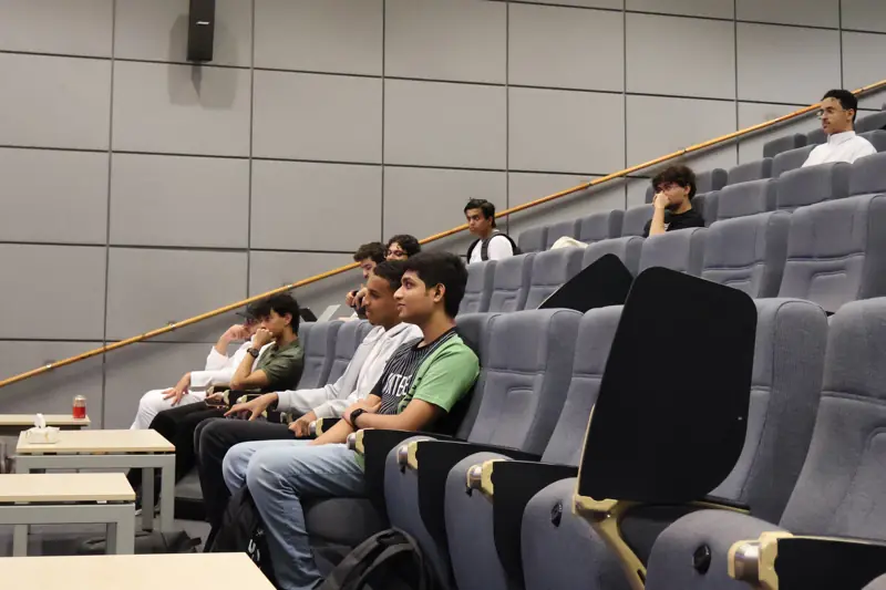 Students seated in the auditorium during the chapter's opening event.
